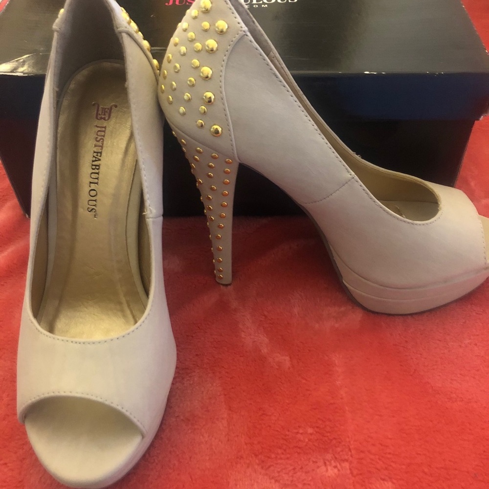 Brand new size 7 nude peep toe high heel